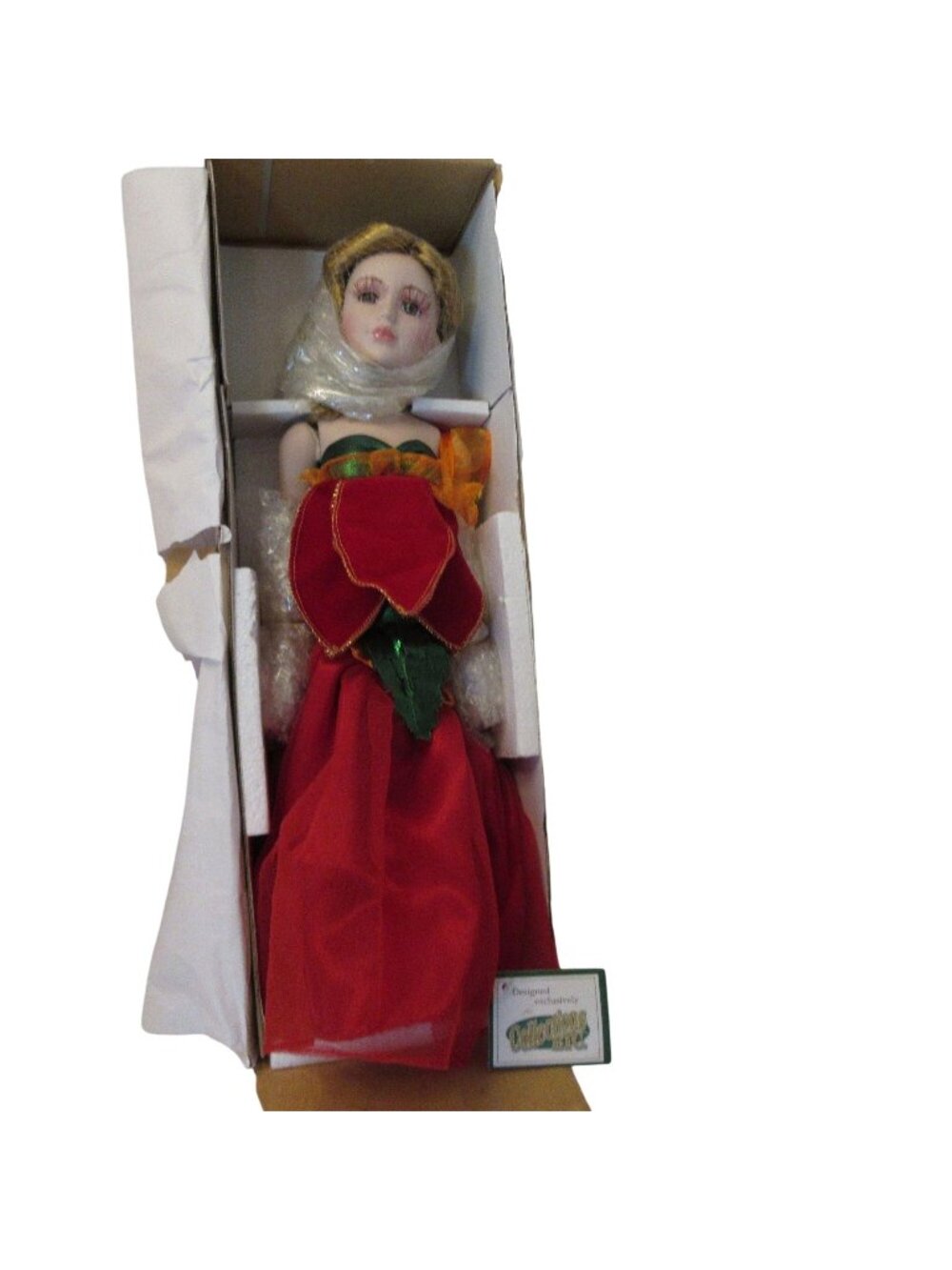 Heritage Signature Poinsettia Porcelain Doll